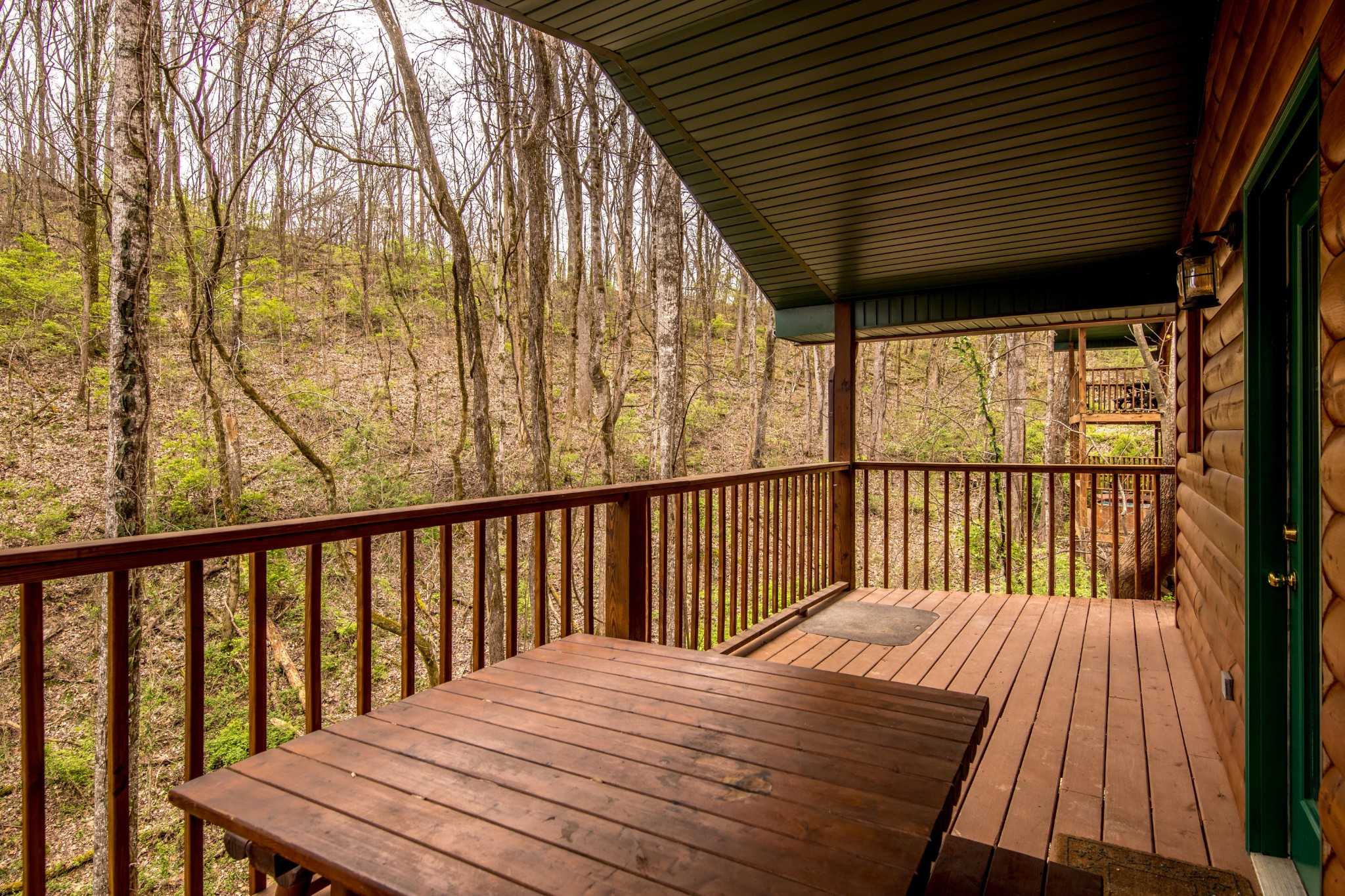 2036 Ridge Road, Unit 7 Sevierville, TN 37863 - Photo 3 of 23 a balcony with wooden floor and outdoor space