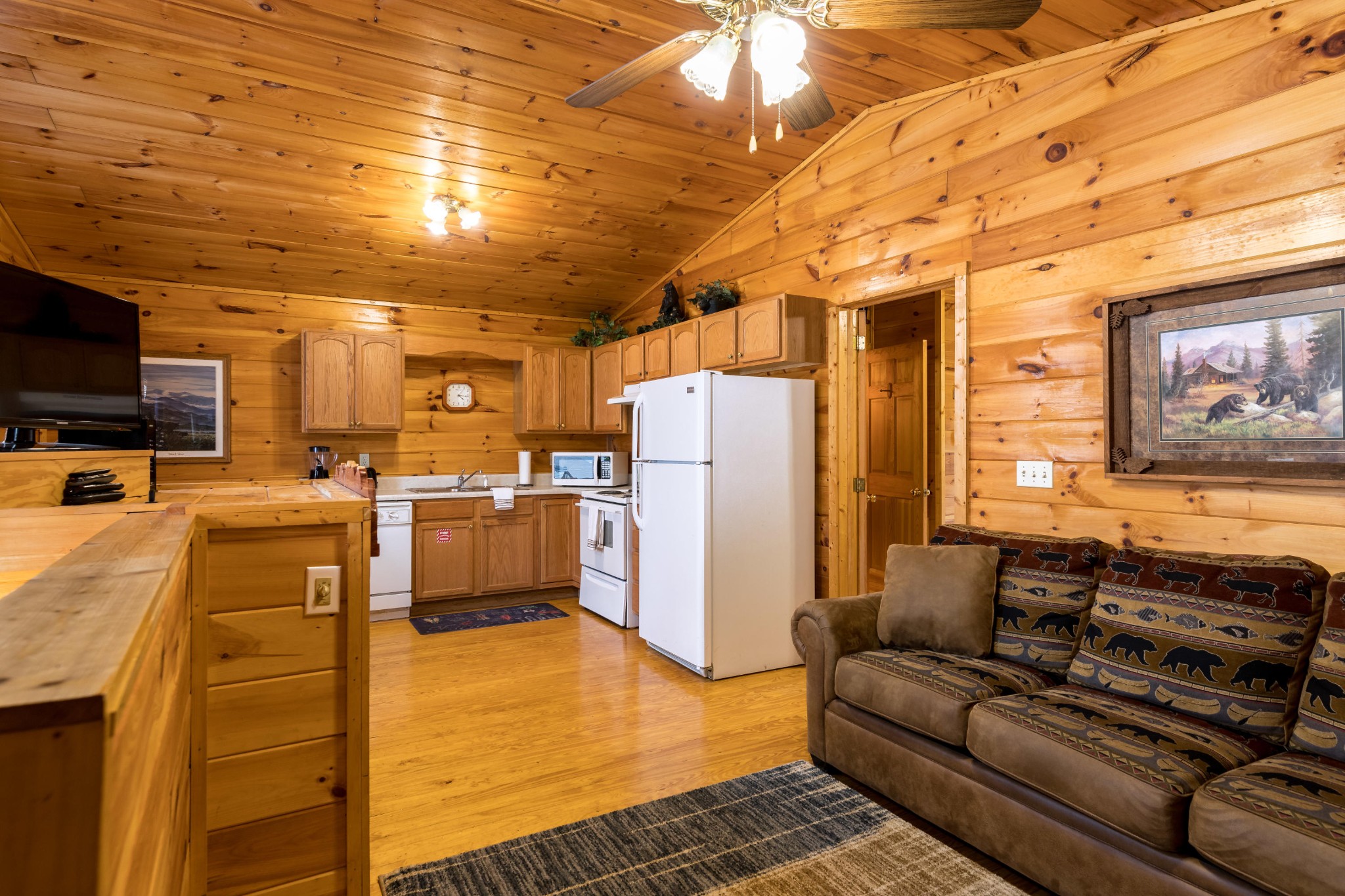2036 Ridge Road, Unit 7 Sevierville, TN 37863 - Photo 7 of 23 a living room with furniture and a flat screen tv