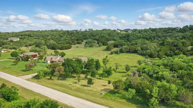 a view of a lake with a city