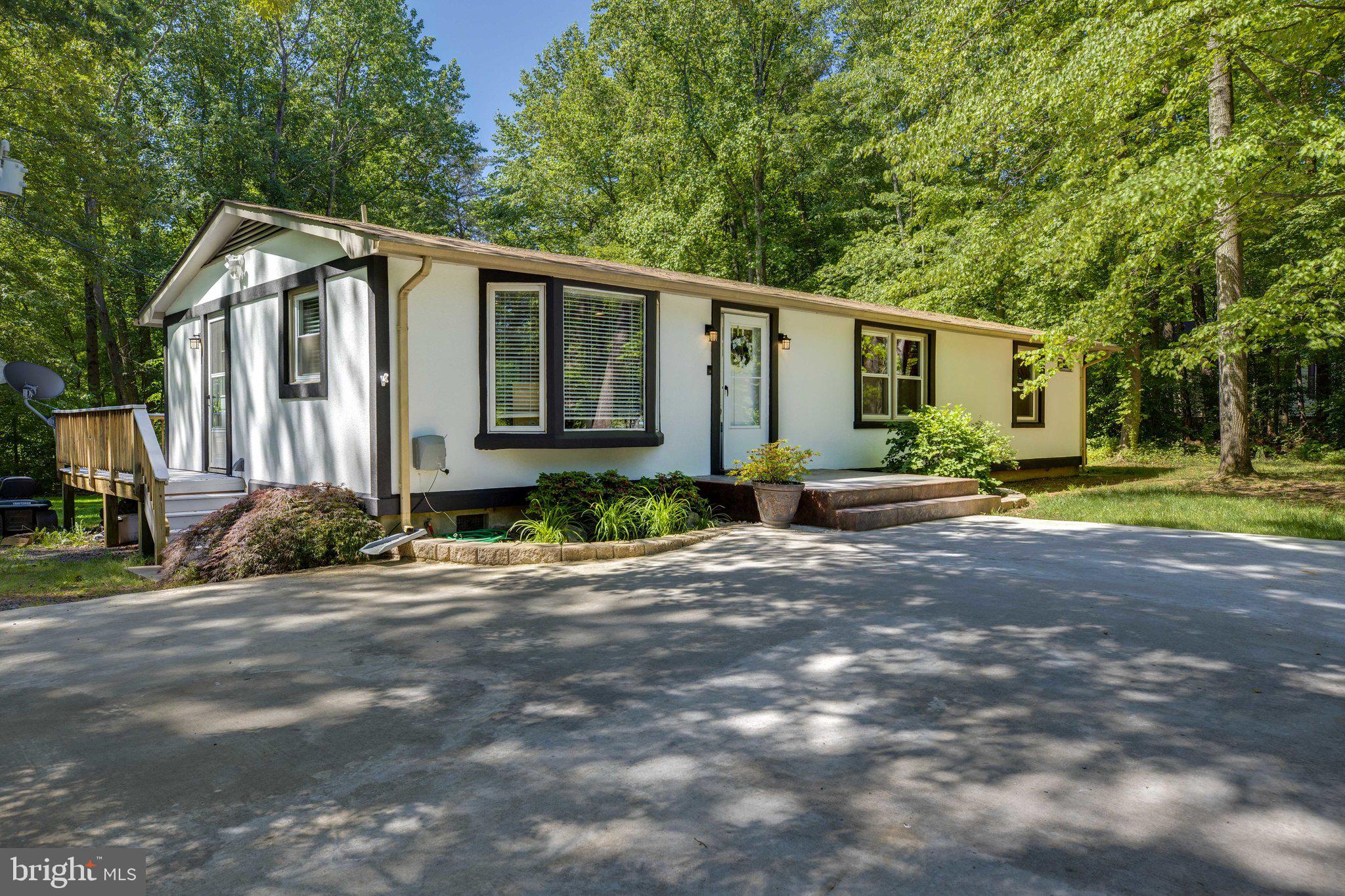 7287 Token Valley Road Manassas, VA 20112 - Photo 1 of 38 Plenty of parking on this ranch style home
