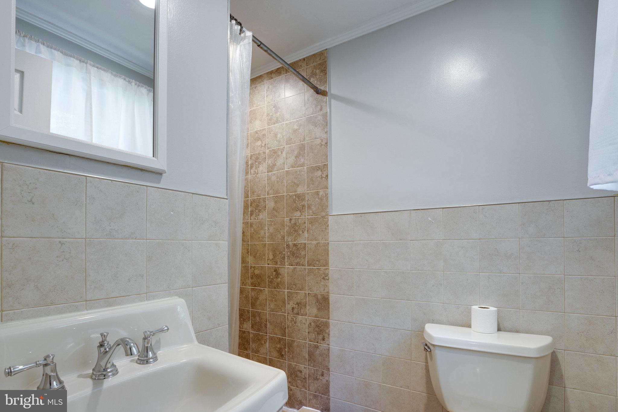 7287 Token Valley Road Manassas, VA 20112 - Photo 17 of 38 En-suite primary bath w/ standing shower