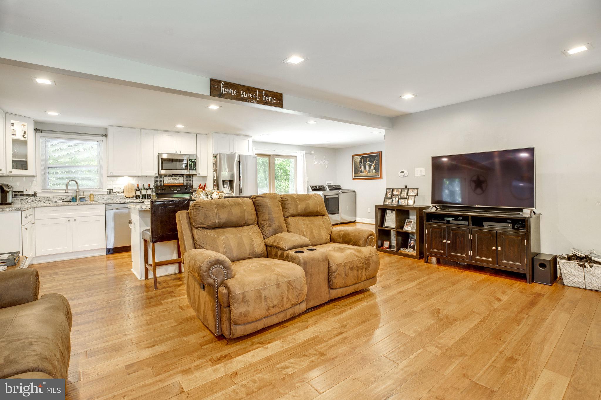 7287 Token Valley Road Manassas, VA 20112 - Photo 5 of 38 Open concept living / kitchen space