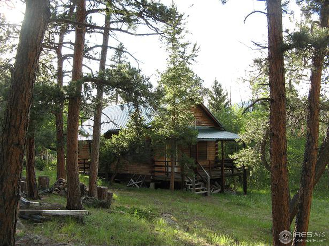 878 Crow Road Red Feather Lakes, CO 80545 - Photo 1 of 16 Cover Front Porch