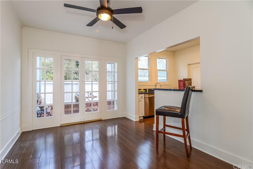 833 Oakwood Place Pasadena, CA 91106 - Photo 5 of 15 a view of a livingroom with wooden floor and a ceiling fan