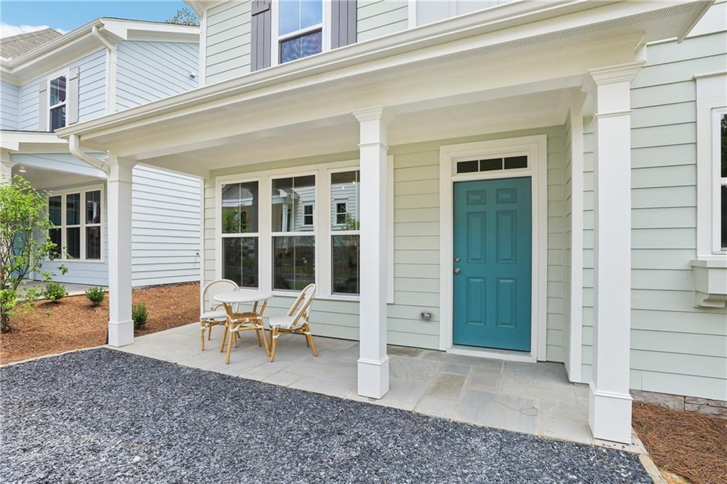 911 East Green Lane Clarkston, GA 30021 - Photo 16 of 43 a view of a house with outdoor seating space