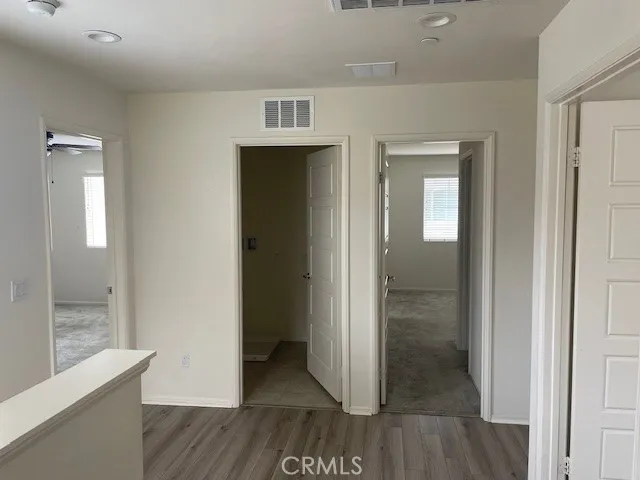 a close view of a sink storage and utility