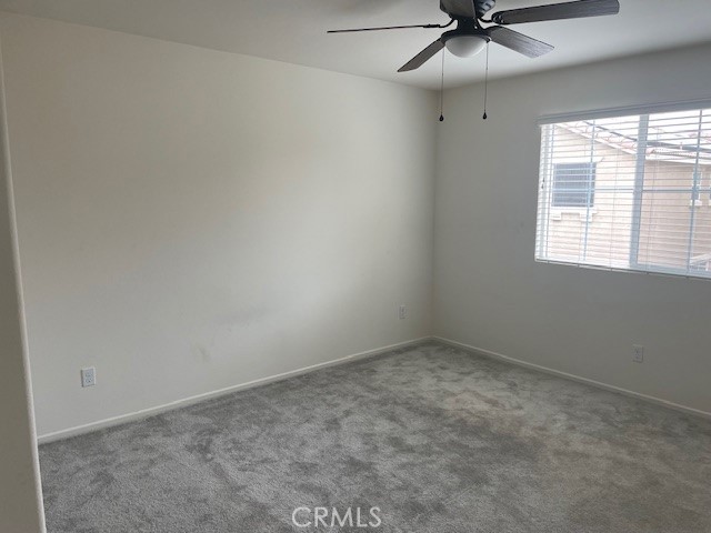 130 Citron Court Perris, CA 92571 - Photo 10 of 32 an empty room with a window