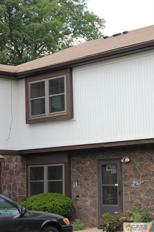 8007 Hana Road Edison, NJ 08817 - Photo 2 of 20 a front view of a house with garden
