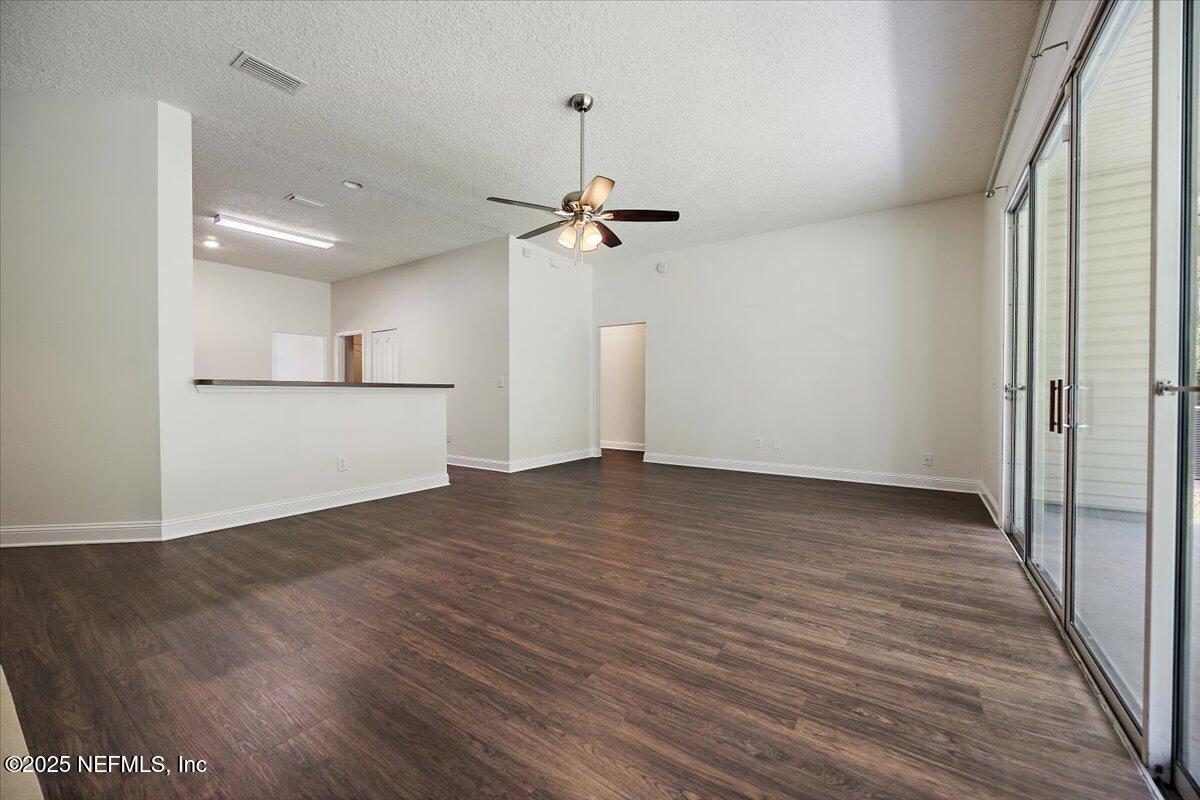 409 Spring Ridge Court St. Augustine, FL 32092 - Photo 6 of 21 06-Family Room to Kitchen