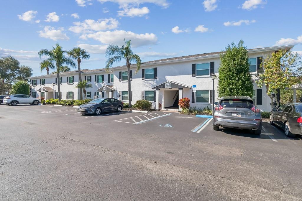 13125 Wilcox Road, Unit 6205 Largo, FL 33774 - Photo 47 of 48 a car parked in front of a building