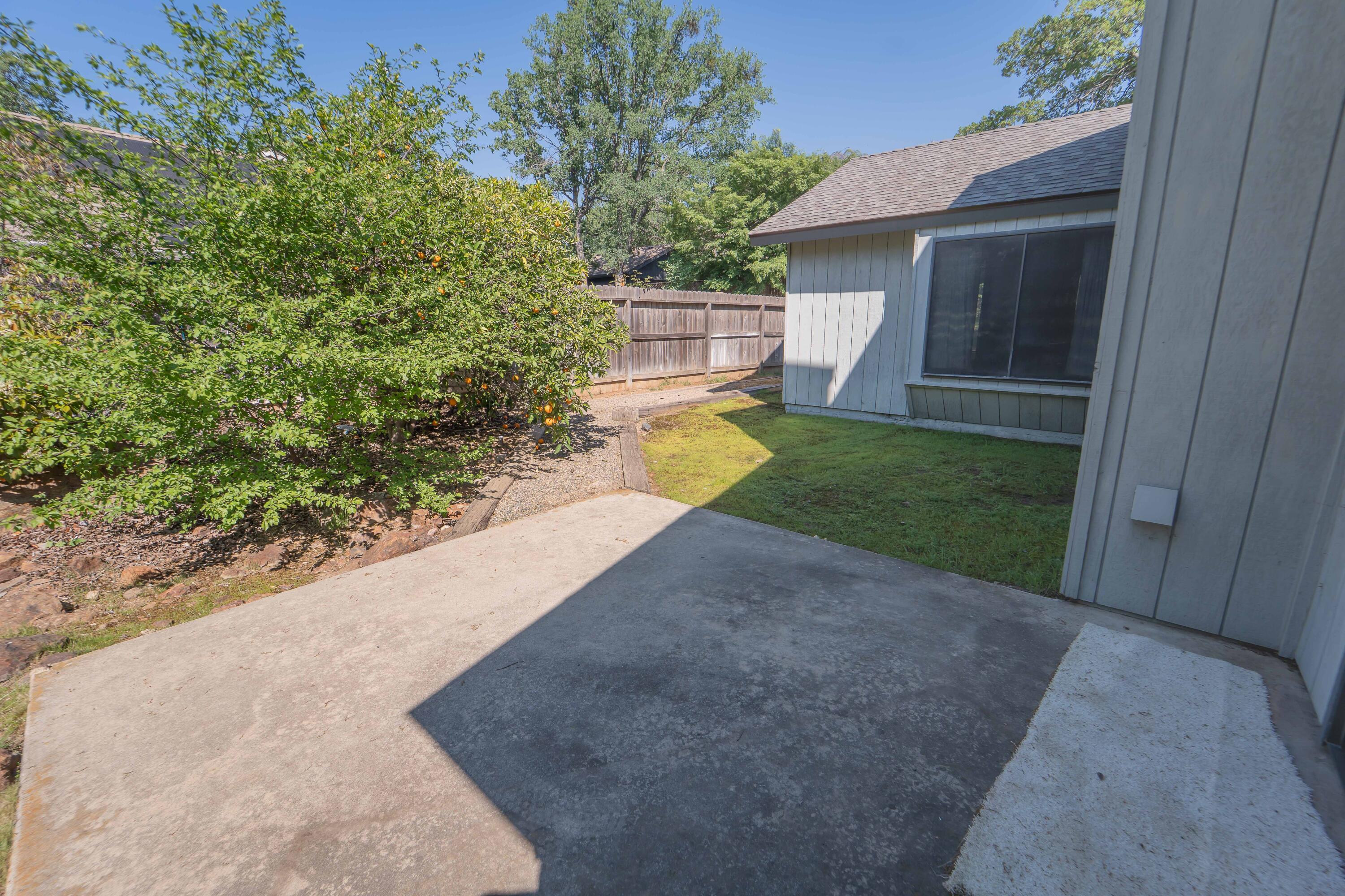 40962 Oak Ridge Drive Three Rivers, CA 93271 - Photo 30 of 36 a view of a house with a yard and garage