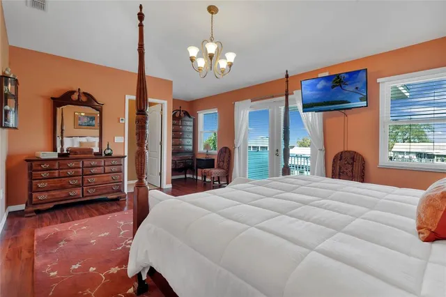 a bedroom with a bed and furniture