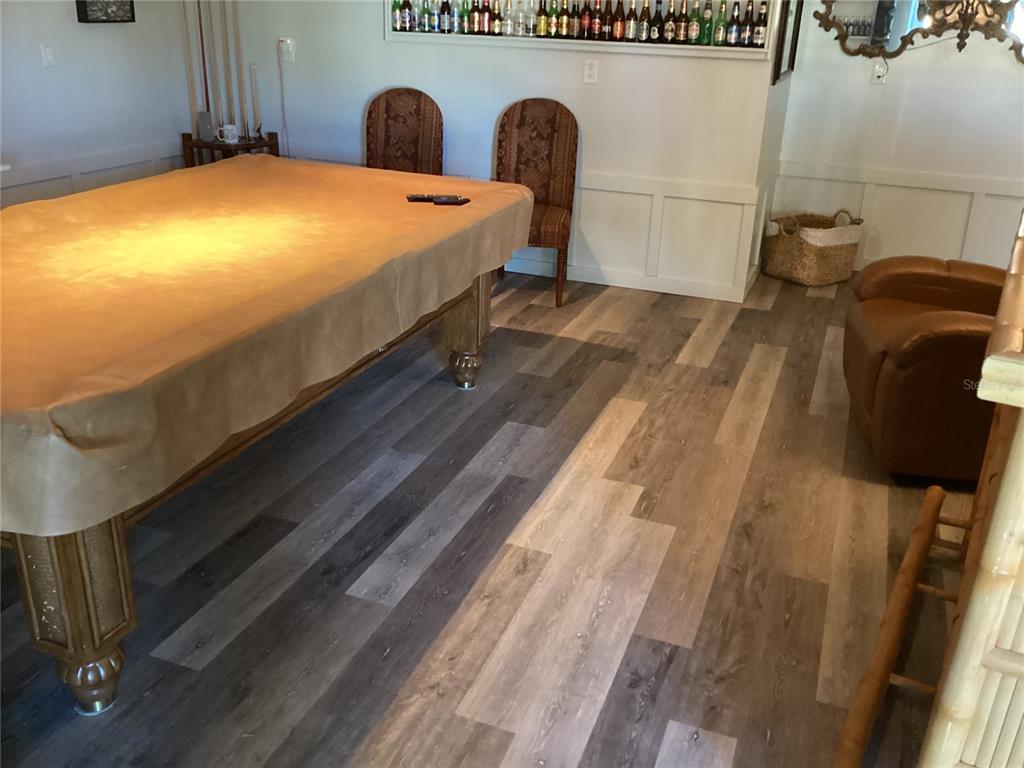 4049 Cobia Drive Hernando Beach, FL 34607 - Photo 28 of 40 a bedroom with a bed and dresser