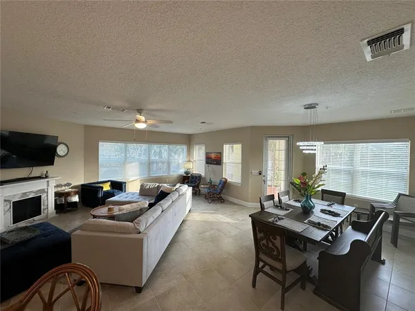 a room with furniture and a chandelier