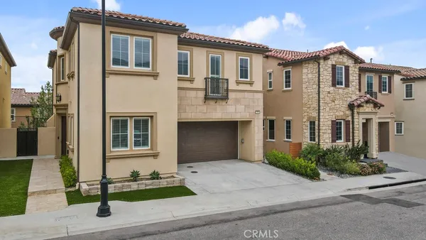 a front view of a house with yard