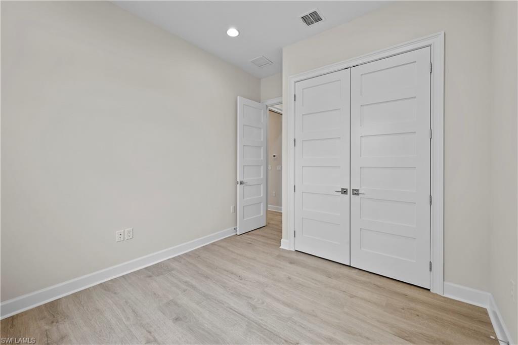 6385 Arriba Avenue Naples, FL 34113 - Photo 20 of 43 a view of an empty room