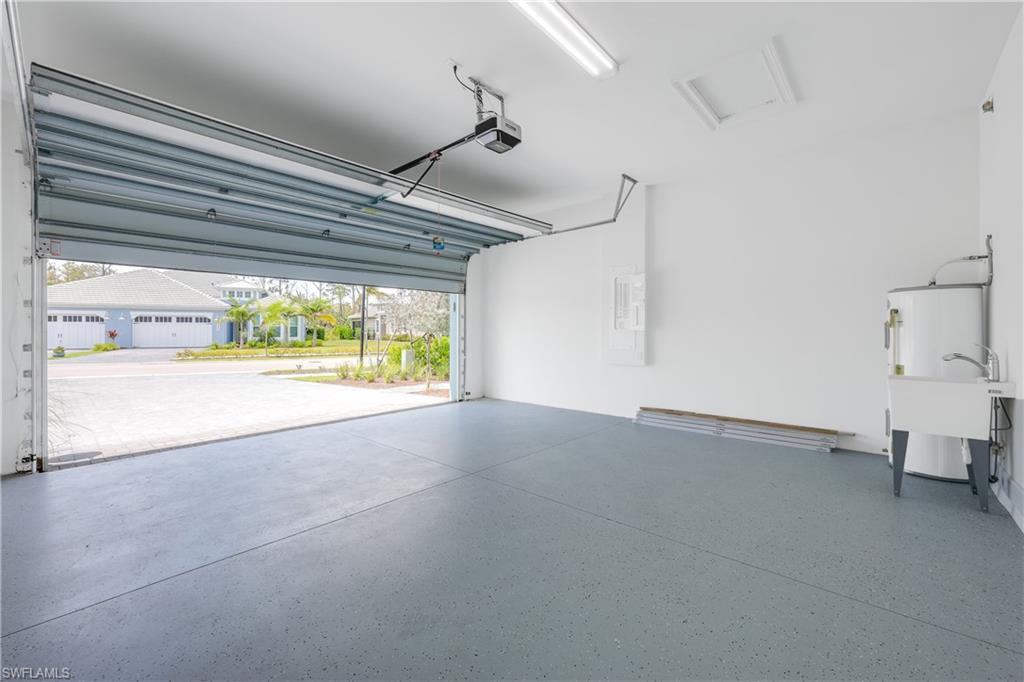 6385 Arriba Avenue Naples, FL 34113 - Photo 23 of 43 a view of a room with wooden floor and a window