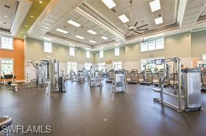 6385 Arriba Avenue Naples, FL 34113 - Photo 38 of 43 a view of a room with lots of wooden furniture