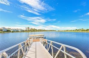 6385 Arriba Avenue Naples, FL 34113 - Photo 43 of 43 a view of a lake from a balcony
