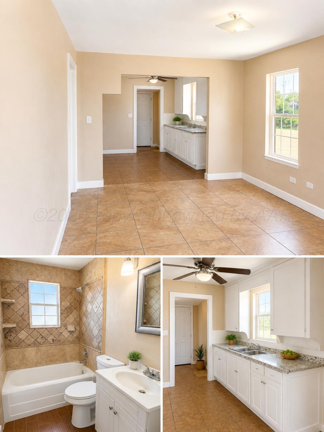 310 Coble Street Borger, TX 79007 - Photo 6 of 7 a view of a kitchen with kitchen island a sink wooden floor and a large window