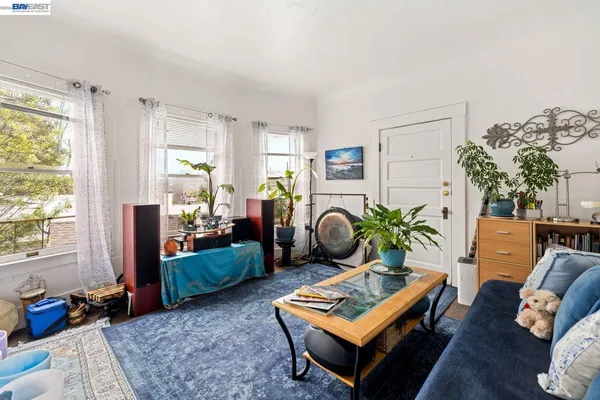 a living room with furniture and a window