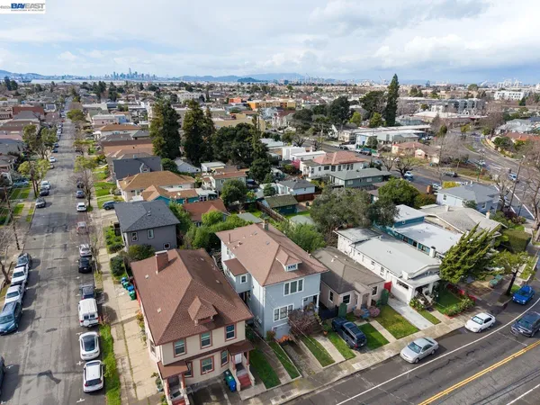 an aerial view of a city with lots of residential buildings