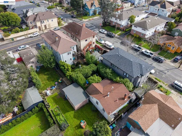 an aerial view of a house with a garden