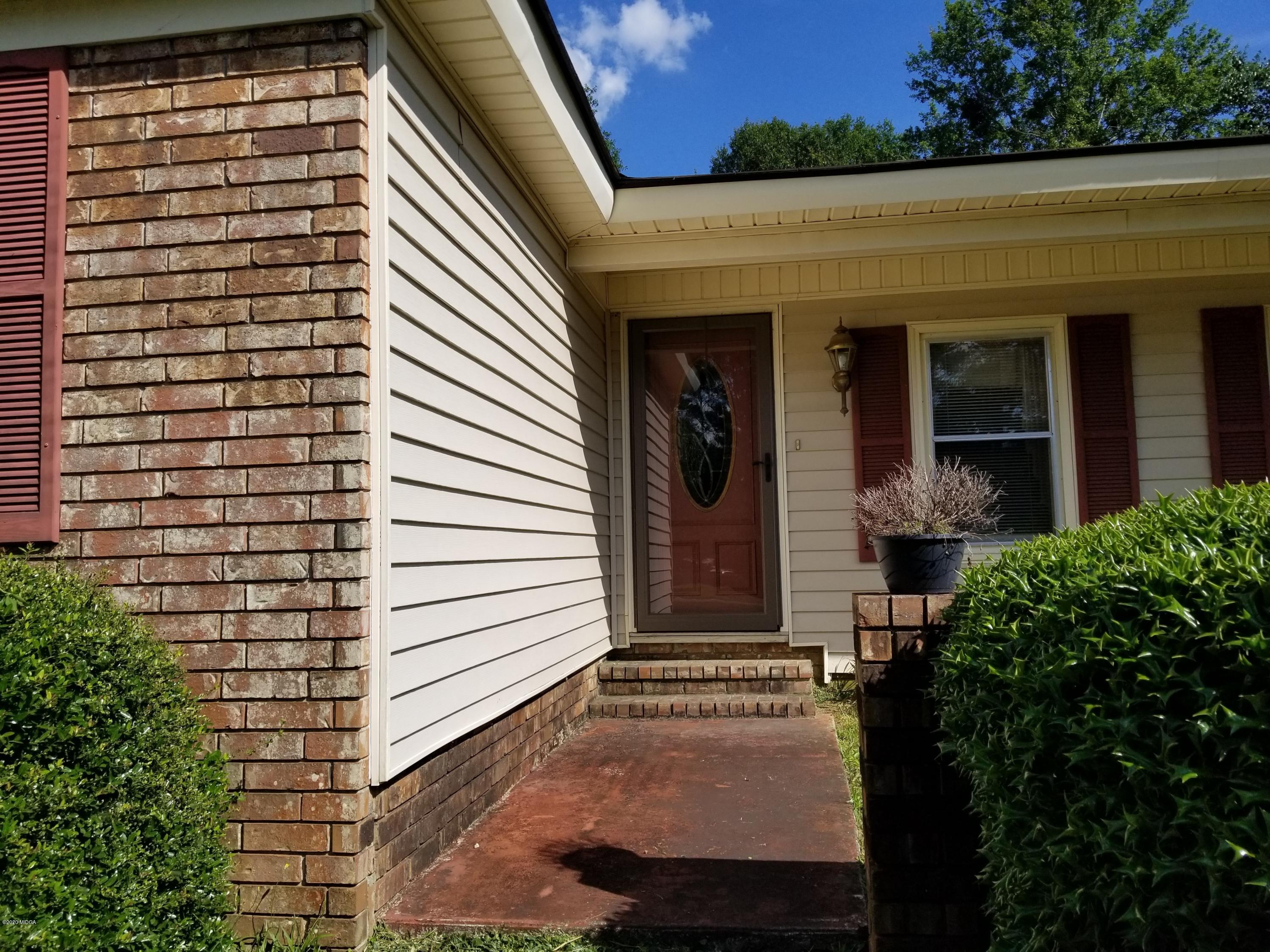 6656 Goodall Mill Road Macon, GA 31216 - Photo 2 of 21 a view of a house with potted plants