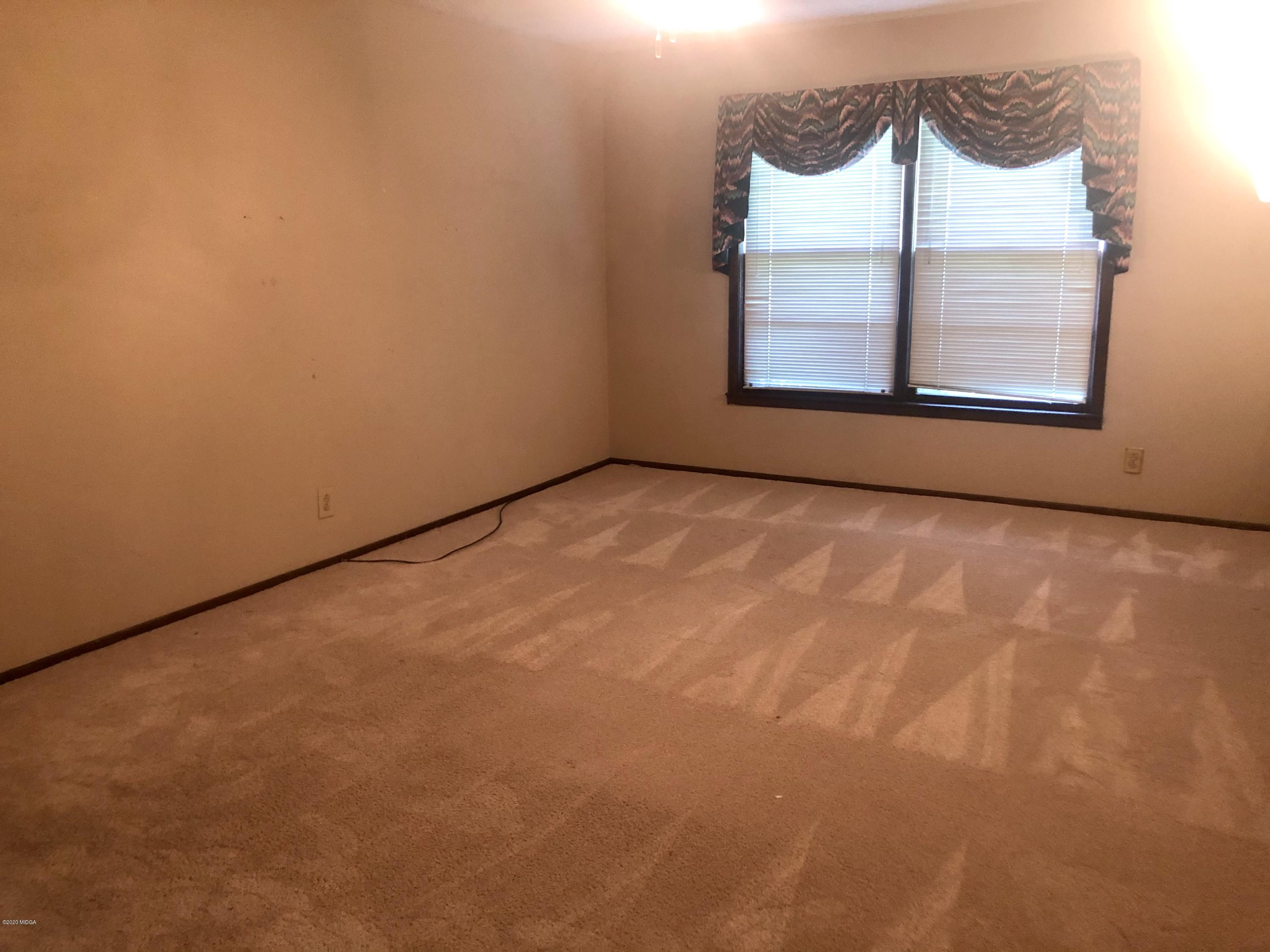 6656 Goodall Mill Road Macon, GA 31216 - Photo 14 of 21 a view of empty room with a window