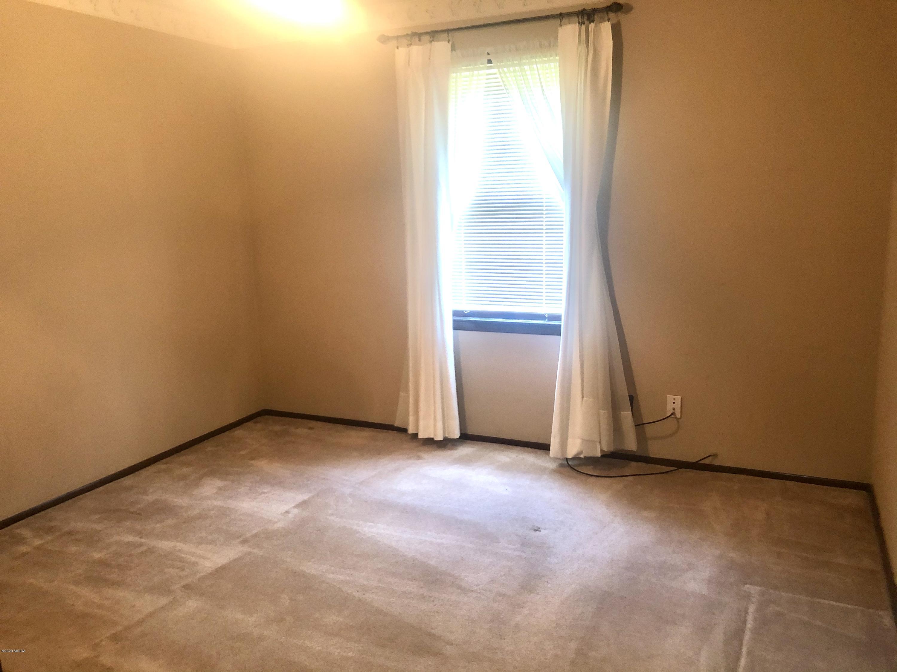 6656 Goodall Mill Road Macon, GA 31216 - Photo 18 of 21 an empty room with a door