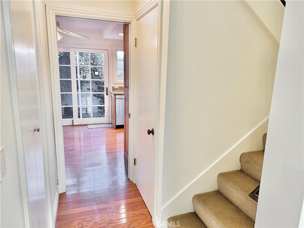 28005-28005 Ridgebluff Court Rancho Palos Verdes, CA 90275 - Photo 25 of 30 a view of a hallway with wooden floor and staircase