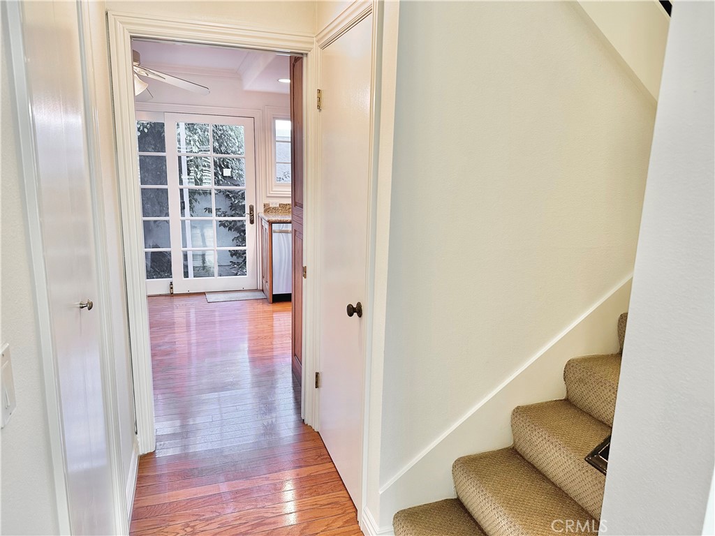 28005-28005 Ridgebluff Court Rancho Palos Verdes, CA 90275 - Photo 10 of 30 a view of a hallway with wooden floor and staircase