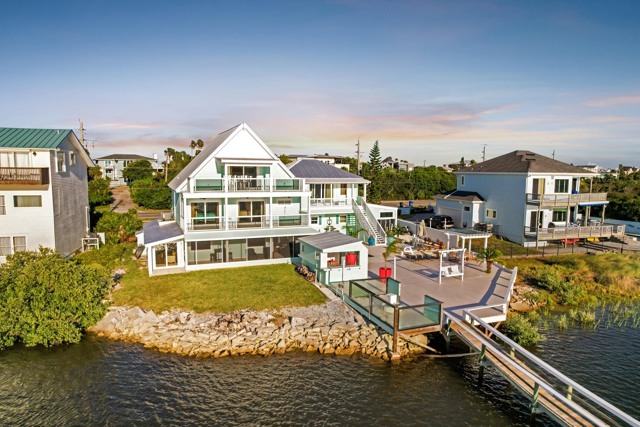 7337 A1A South St. Augustine, FL 32080 - Photo 11 of 100 Dock featuring a water view, a patio area, a balcony, boat lift, and stairway