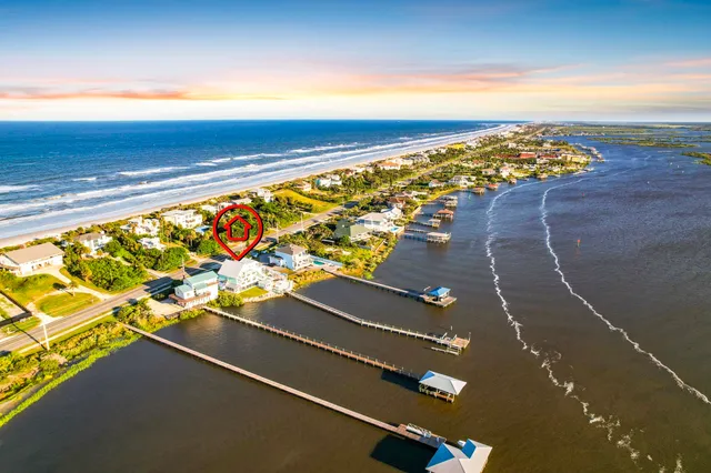 a view of a house with a swimming pool