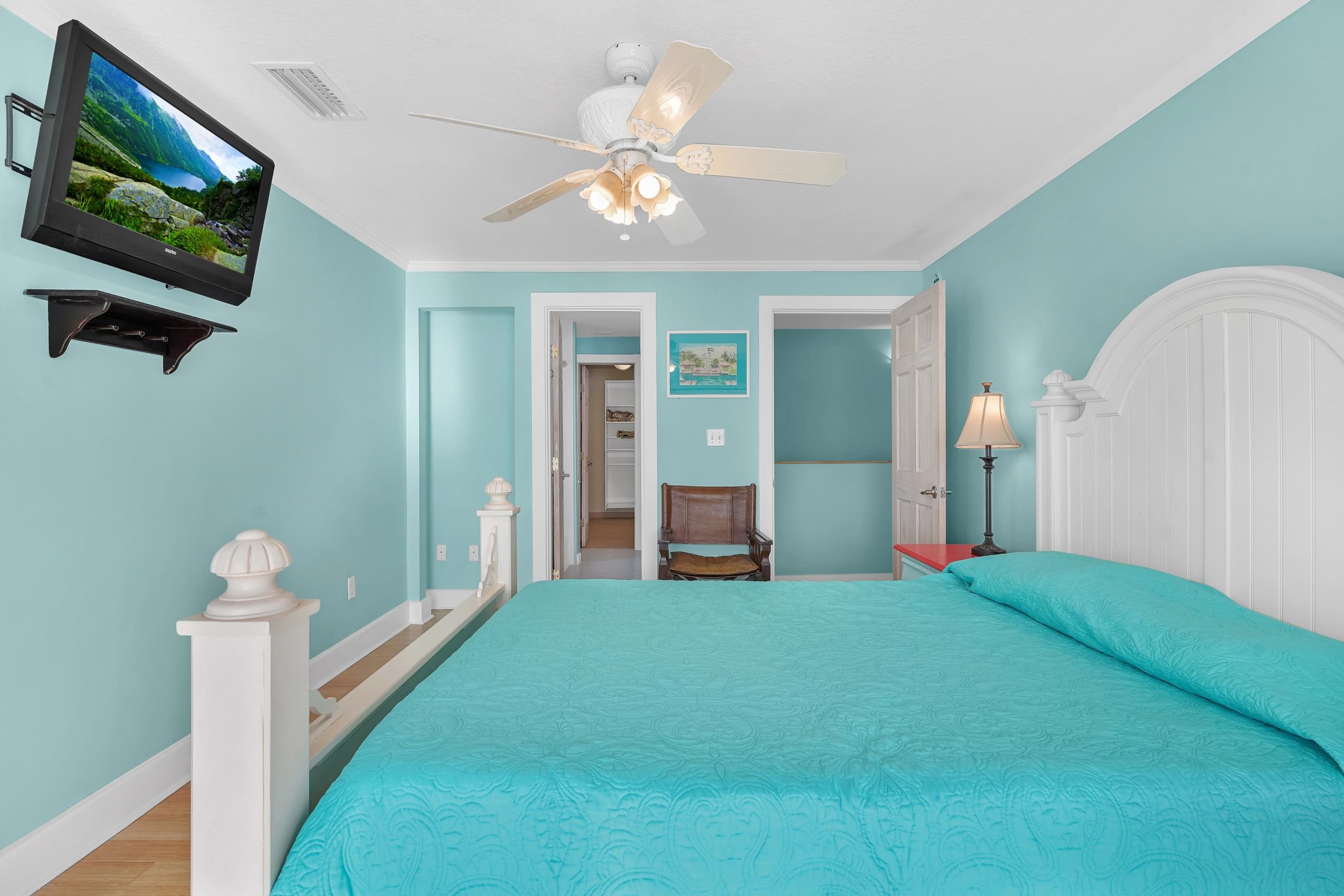 7337 A1A South St. Augustine, FL 32080 - Photo 19 of 100 Bedroom with wood finished floors, a ceiling fan, and ornamental molding looking out on the intracoastal
