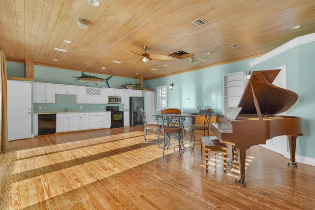 a view of swimming pool with outdoor seating