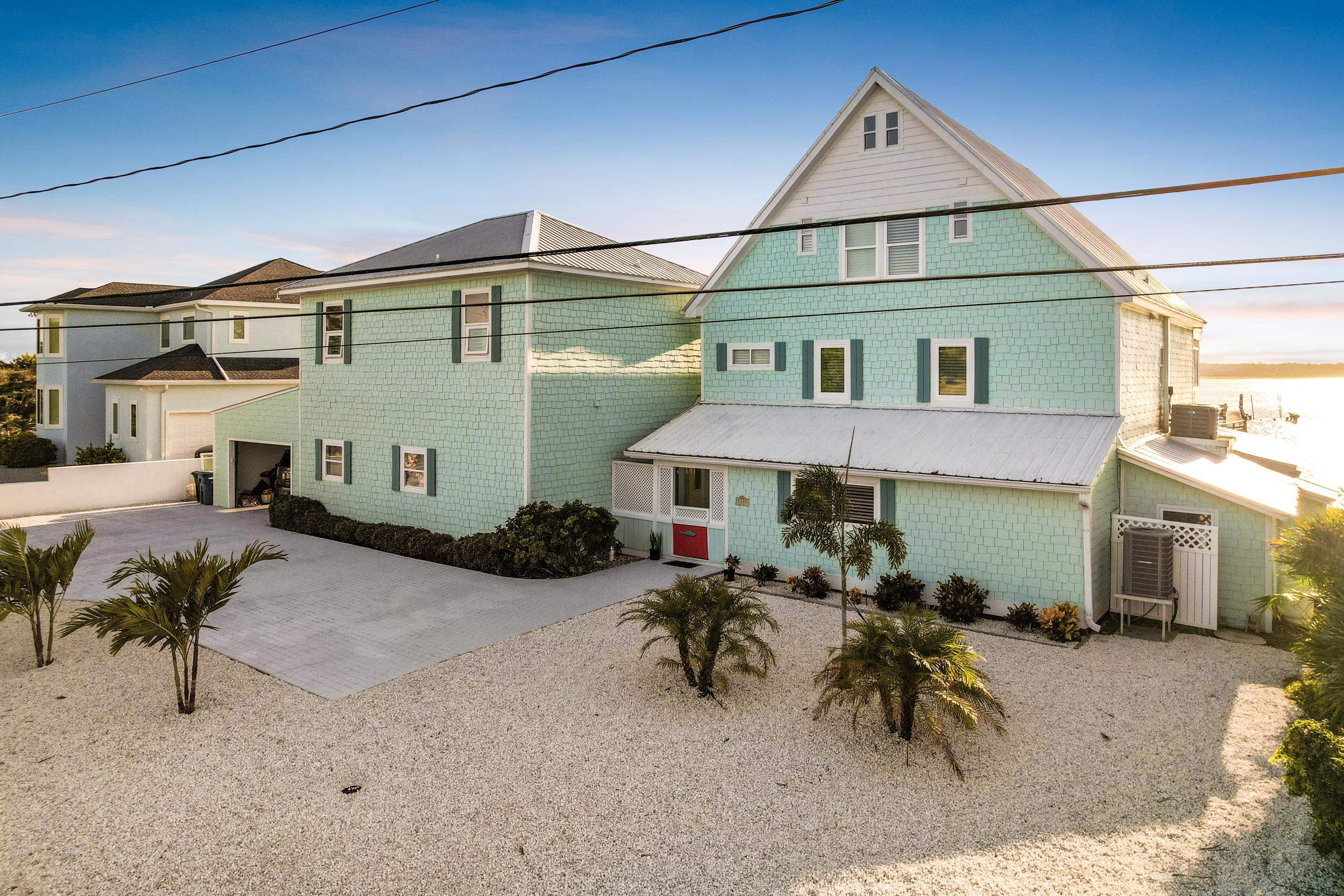 7337 A1A South St. Augustine, FL 32080 - Photo 23 of 100 Back of house featuring decorative driveway
