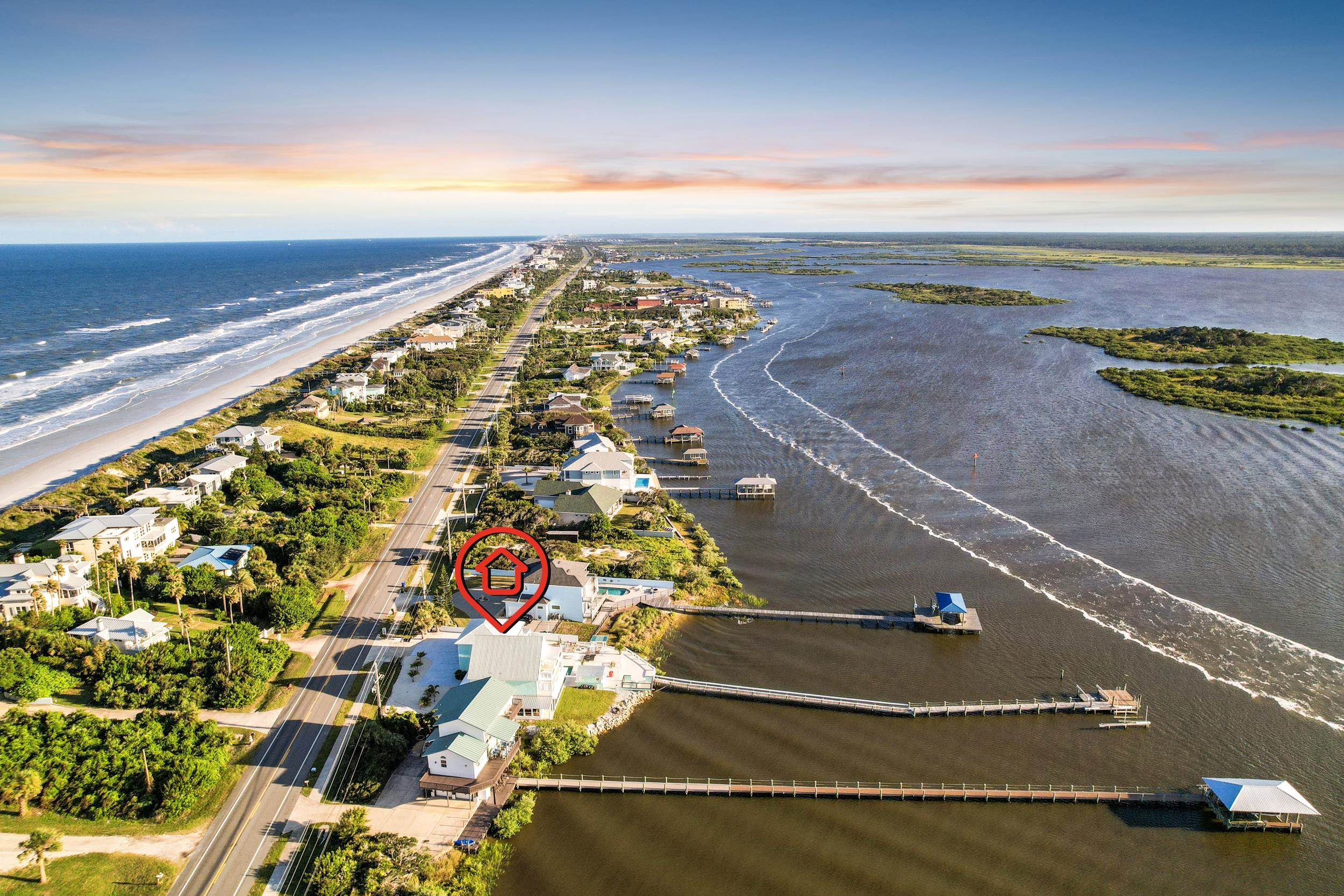 7337 A1A South St. Augustine, FL 32080 - Photo 23 of 100 Aerial view of property and surrounding area featuring a nearby body of water and nearby suburban area