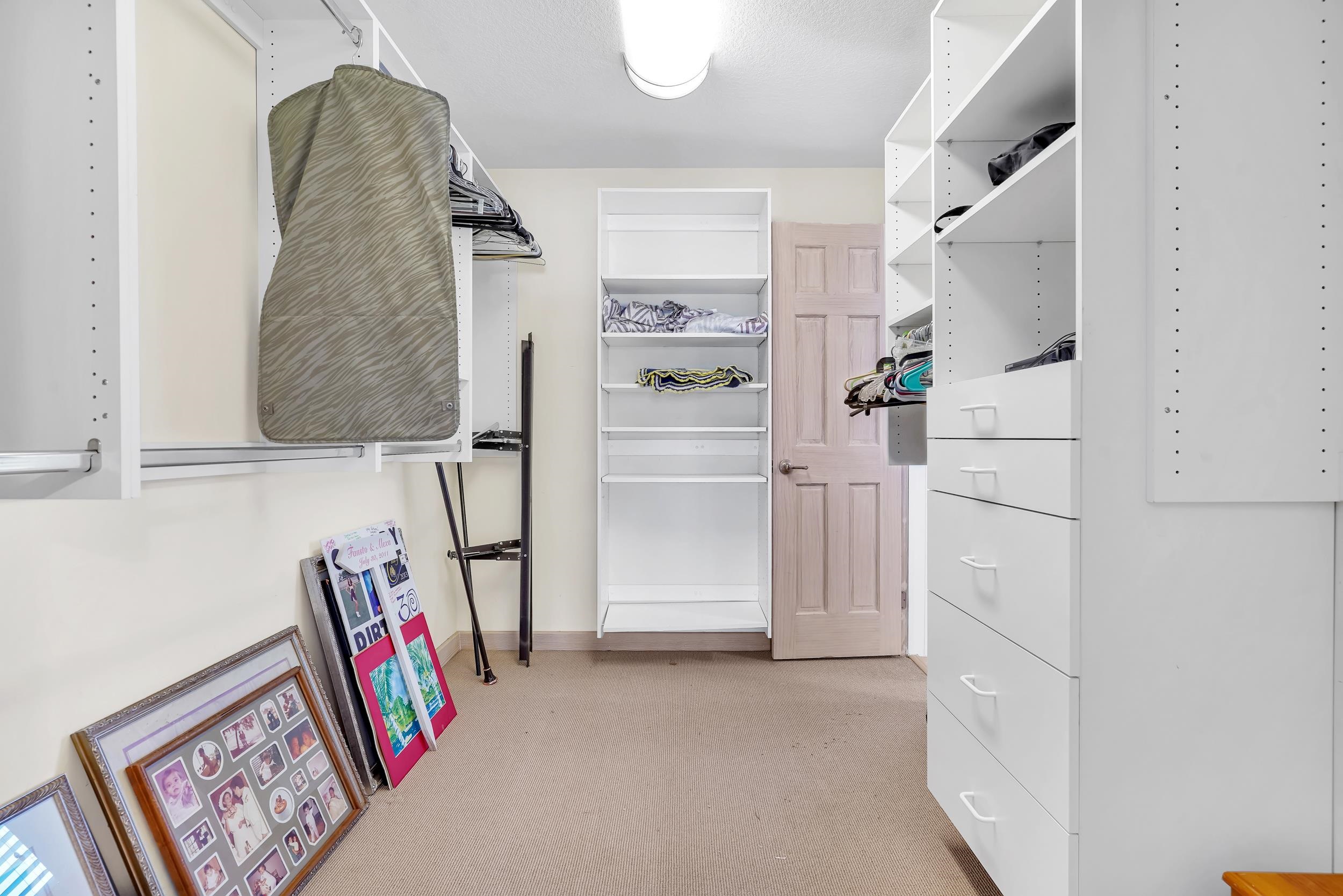 7337 A1A South St. Augustine, FL 32080 - Photo 58 of 100 Walk in closet featuring light colored carpet