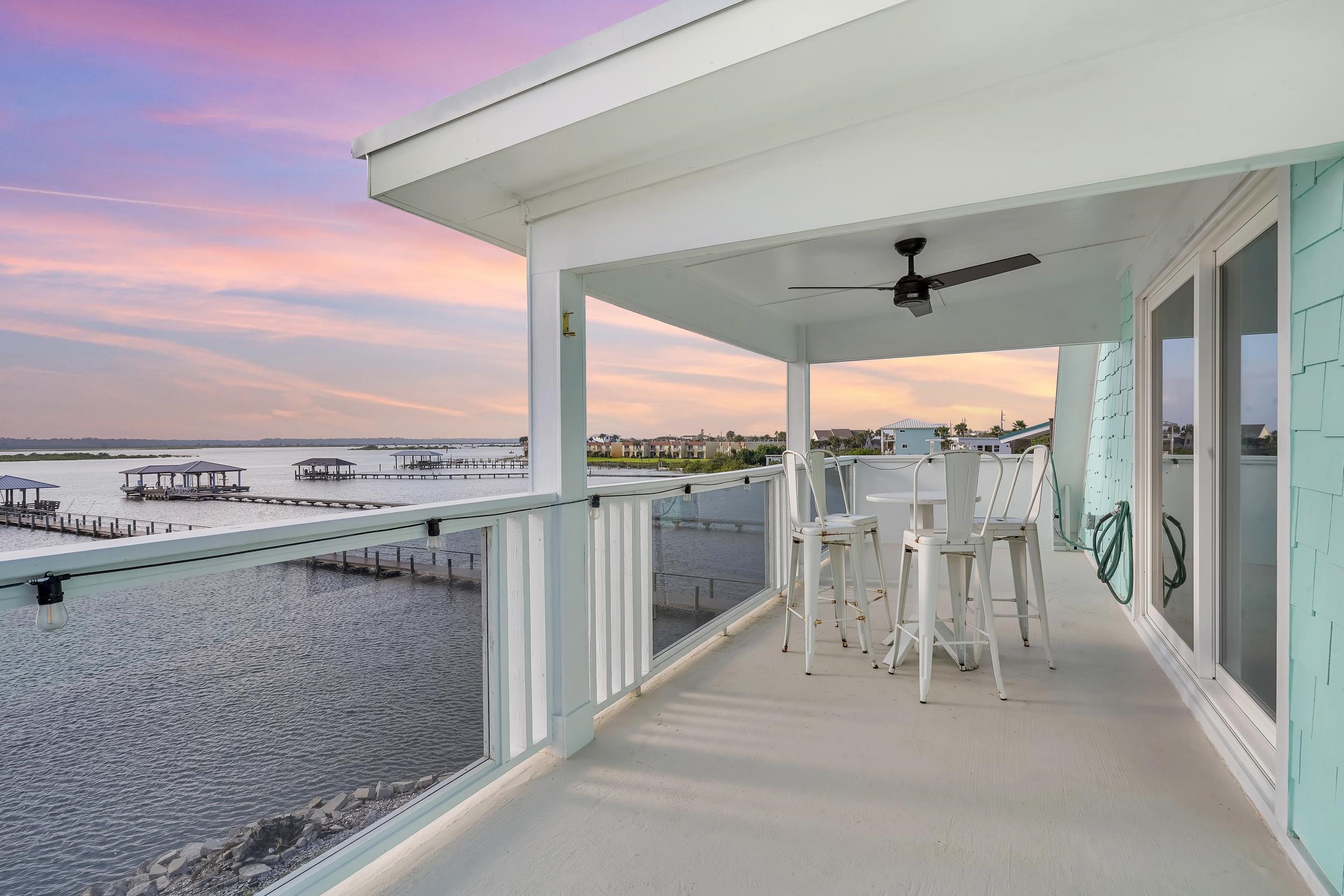 7337 A1A South St. Augustine, FL 32080 - Photo 58 of 100 Balcony with ceiling fan and a water view
