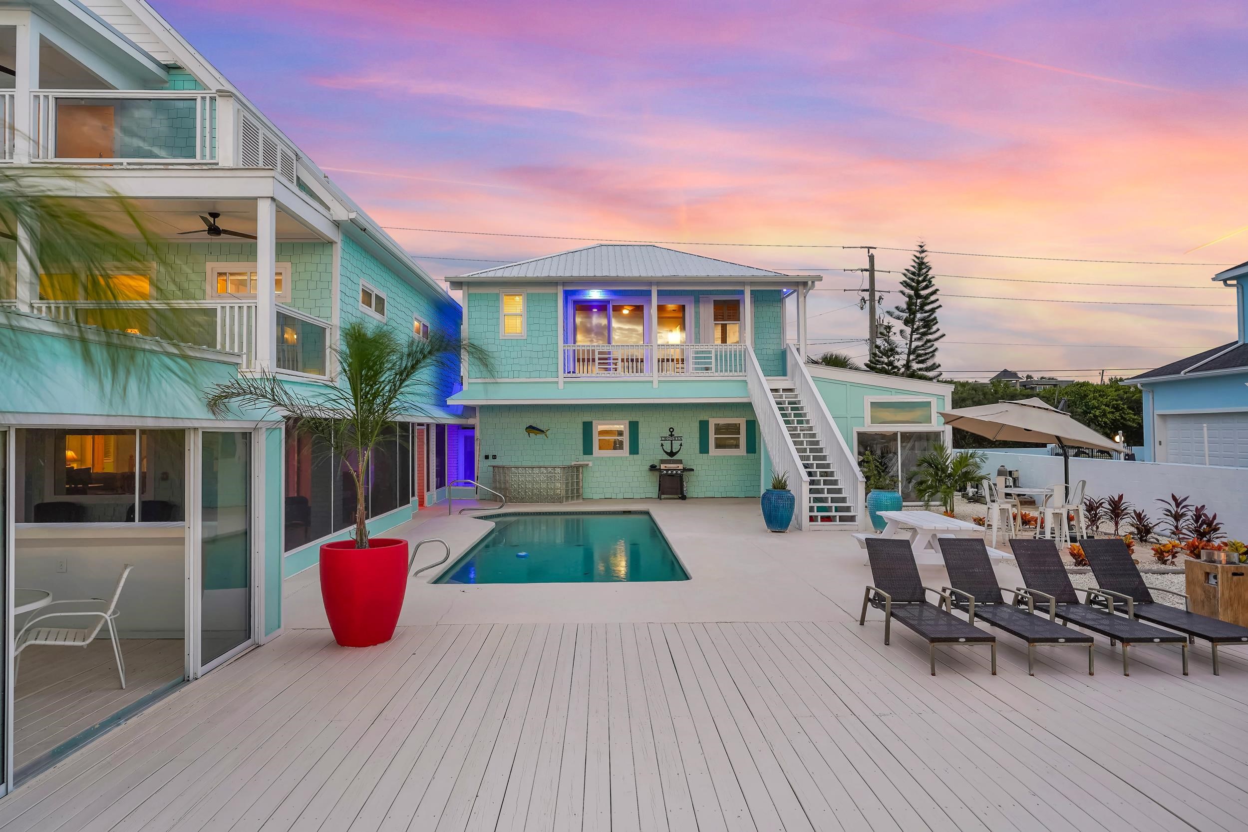 7337 A1A South St. Augustine, FL 32080 - Photo 63 of 100 View of swimming pool featuring a patio, stairs, a wooden deck, and a balcony
