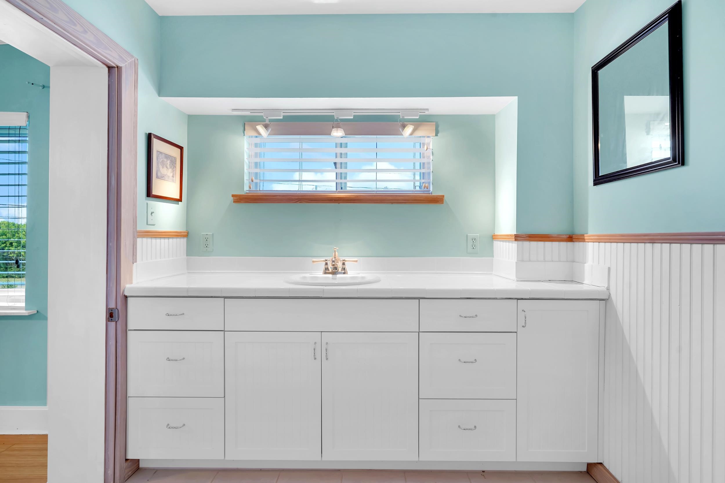 7337 A1A South St. Augustine, FL 32080 - Photo 67 of 100 Bathroom with vanity and baseboards