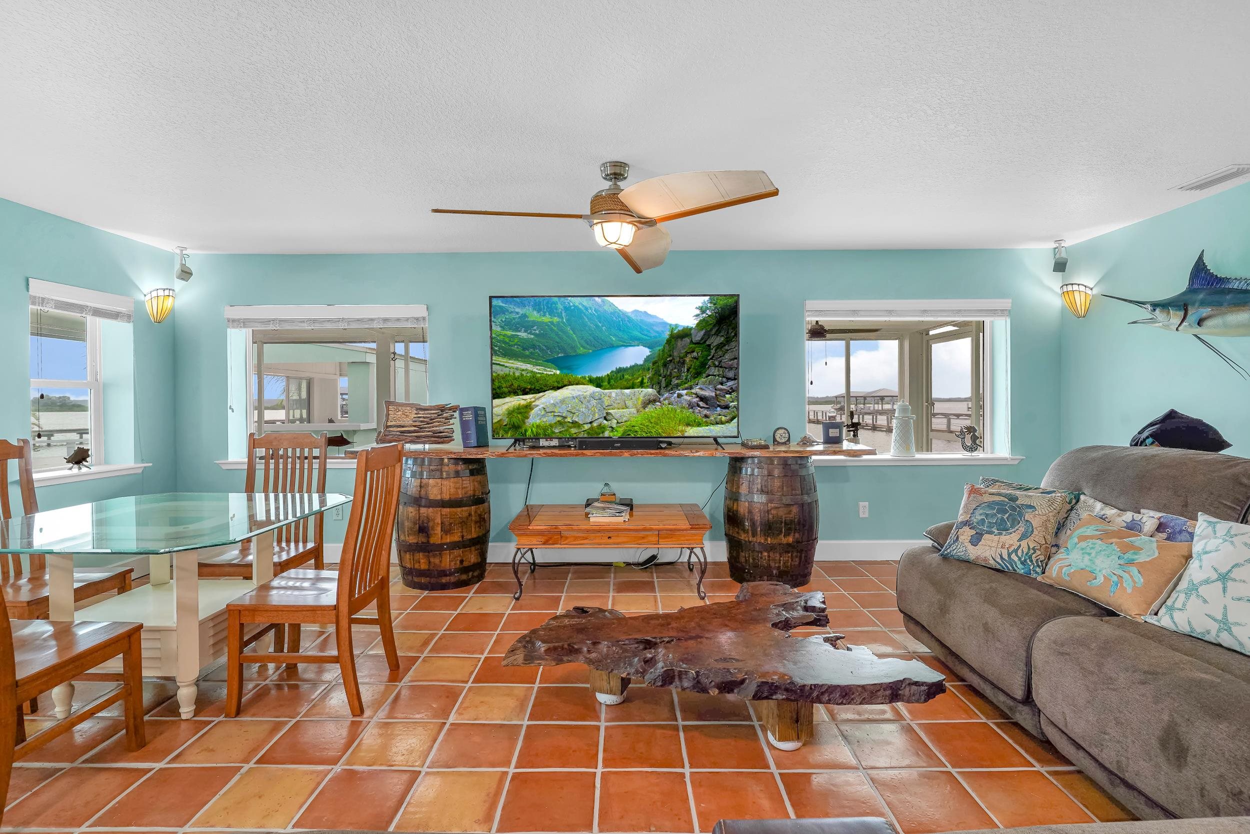 7337 A1A South St. Augustine, FL 32080 - Photo 77 of 100 Tiled living area with a textured ceiling and ceiling fan