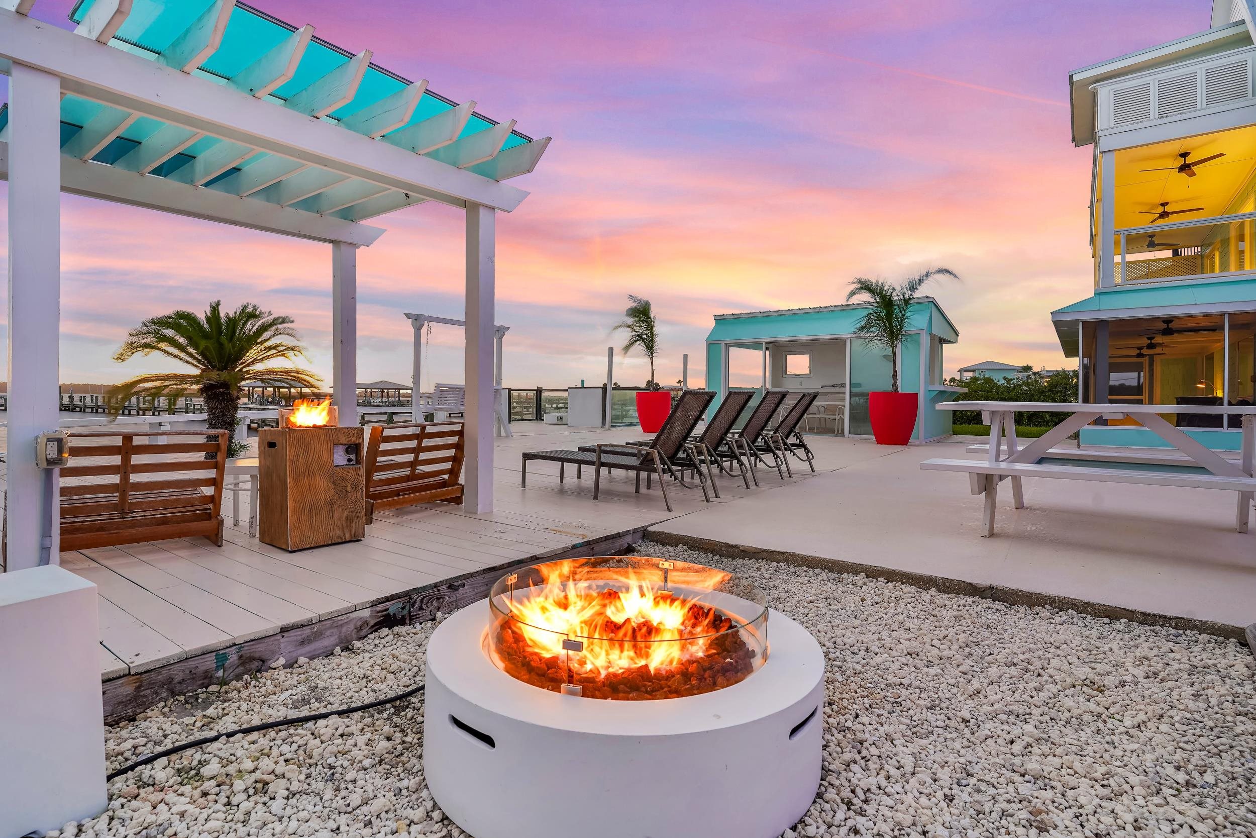7337 A1A South St. Augustine, FL 32080 - Photo 93 of 100 Patio terrace at dusk featuring a patio area, ceiling fan, and a pergola