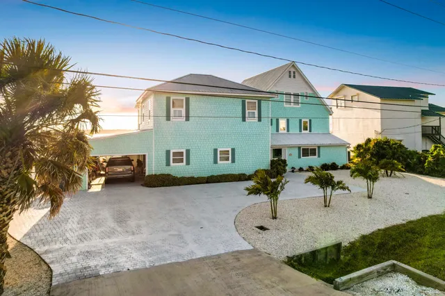 a view of parking garage with cars