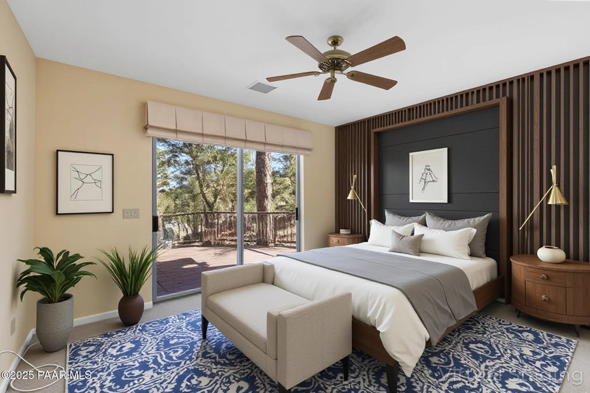 1741 Conifer Ridge Lane Prescott, AZ 86303 - Photo 42 of 78 a bedroom with a large bed and a couch