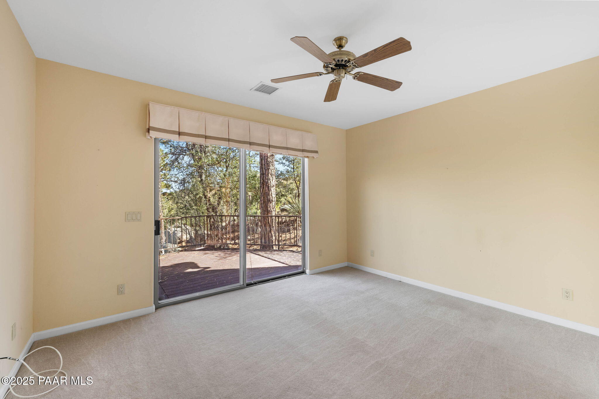 1741 Conifer Ridge Lane Prescott, AZ 86303 - Photo 44 of 78 a view of a livingroom with a ceiling fan and a large window