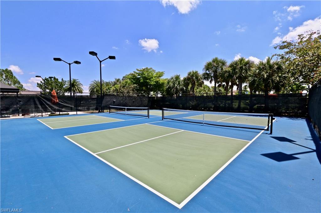 8337 Promoso Court Naples, FL 34114 - Photo 46 of 48 a view of a tennis court