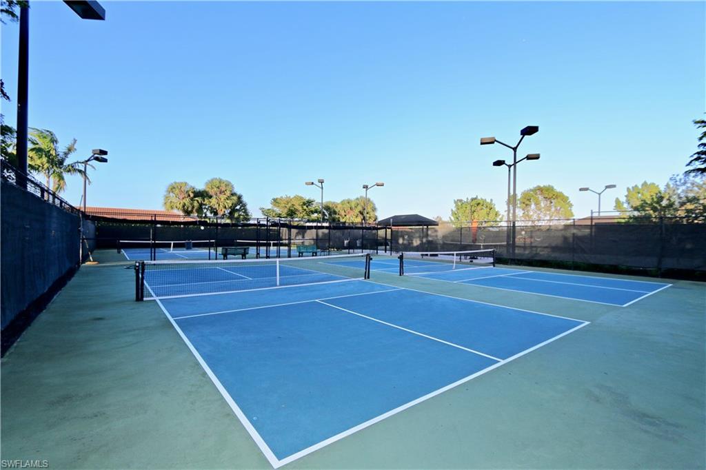 8337 Promoso Court Naples, FL 34114 - Photo 48 of 48 a view of a tennis court