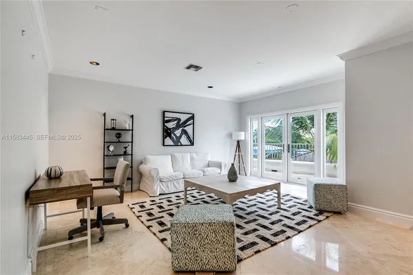 a living room with furniture and window